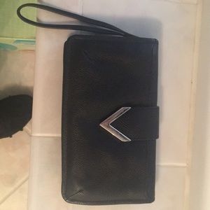 Clarks wallet with front and back compartments.